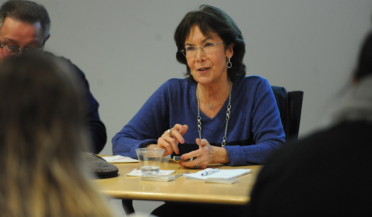 Professor speaking at meeting
